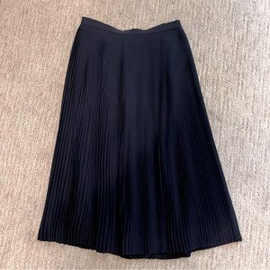 Navy pleated midi skirt
